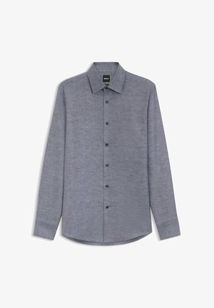 Chemise pour homme à manches longues, boutonnée, en gris chiné avec un col classique et des boutons noirs, présentée sur un fond blanc.