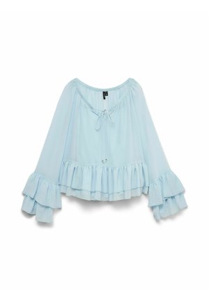 Blusa recortada en azul claro con mangas largas de campana, con un dobladillo con volantes y un escote con cordón ajustable. Tejido texturizado.