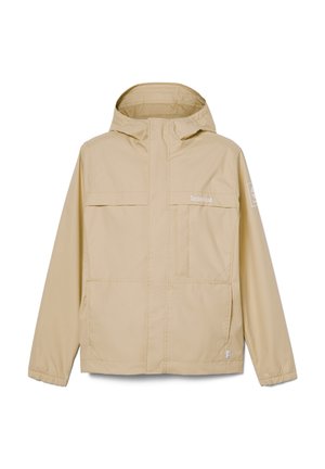 Giacca beige con cappuccio realizzata in un materiale leggero e idrorepellente, due tasche anteriori con patta e un logo sul petto e sulla manica.