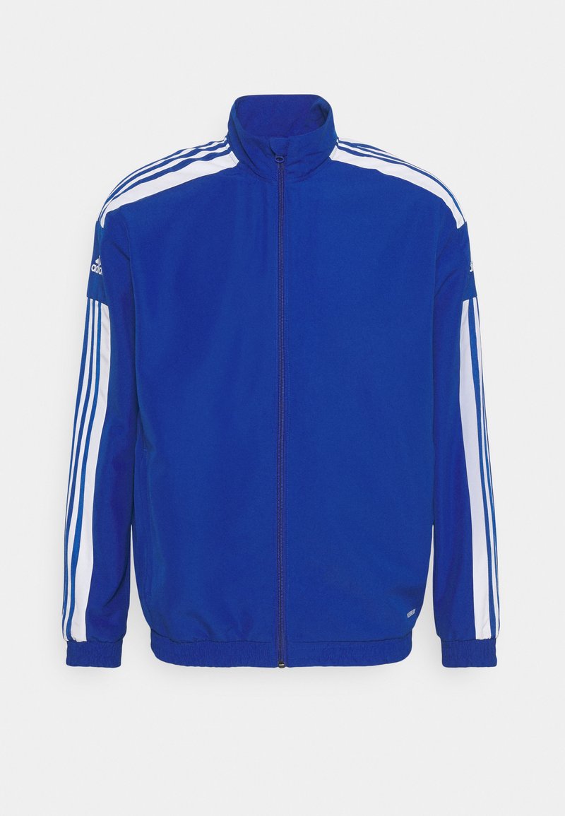Blaue Sportjacke mit weißen Schulterstreifen, hohem Kragen, Frontreißverschluss und elastischen Bündchen. Hergestellt aus glattem Stoff.