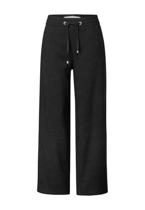 Pantaloni neri a gamba larga realizzati in un tessuto morbido e testurizzato. Presentano una cintura elastica con cordoncino e occhielli in argento.
