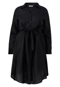 Schwarzes Leinenhemdkleid mit durchgehender Knopfleiste, langen Ärmeln und gebundenem Taillengürtel. Abgerundeter Saum und eine einzelne Brusttasche.