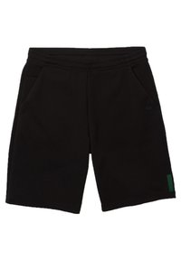 Shorts de sport noirs en tissu mélangé coton. Dotés d'une taille élastique, de deux poches latérales et d'une touche de vert sur un côté.