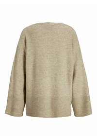 Beige stickad tröja med lös passform, sänkta axlar, ribbat kant och mjuk textur. Ren finish utan synliga sömmar eller dekorationer.