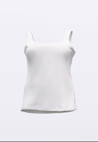 Haut blanc sans manches en tissu doux, avec un col carré et un ourlet droit. Design simple sans motifs ni accents visibles.