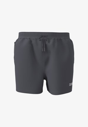 Donkergrijze zwembroek met elastische tailleband, trekkoord, zijvak met ritssluiting en klein wit Calvin Klein-logo op het been.