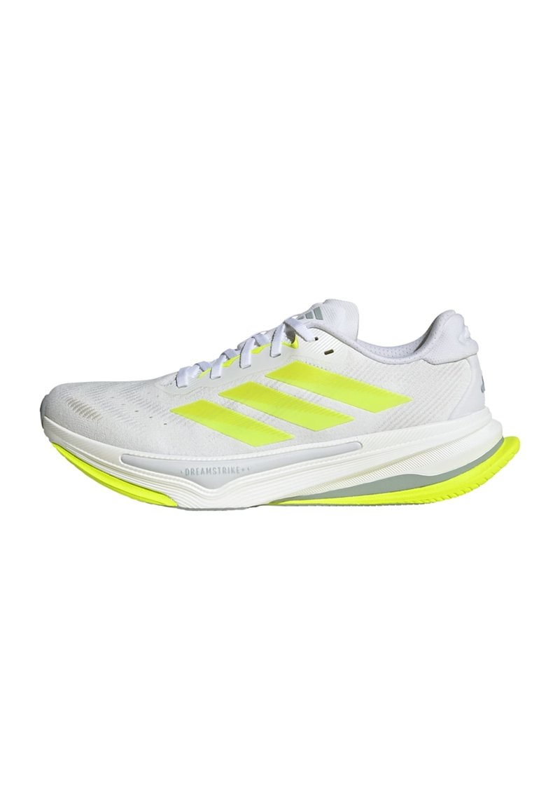 White athletic shoes with neon yellow accents, a mesh upper, three stripes logo, and a cushioned sole designed for comfort and performance.