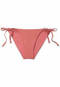 Bas de bikini rose avec des liens latéraux réglables et un tissu lisse, conçu pour une utilisation en maillot de bain.