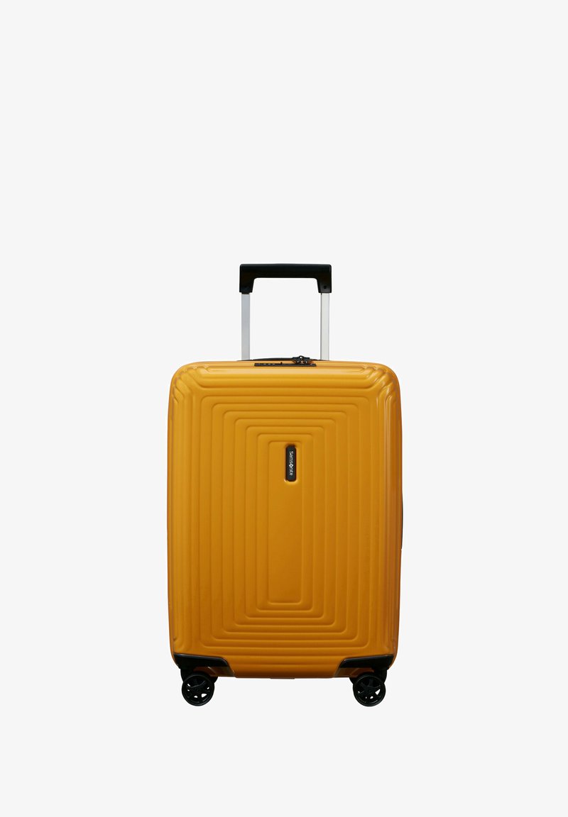 Hard-shell yellow suitcase with a textured linear design, black accents, a telescoping handle, and four wheels for mobility.