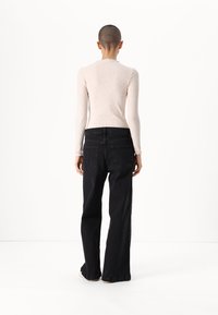 GAP Petite STRIDE SAVILLE - Wide leg - washed black