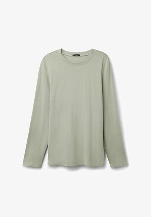 T-shirt à manches longues en coton vert clair, avec un col rond, un ourlet droit et des fentes latérales pour faciliter les mouvements.