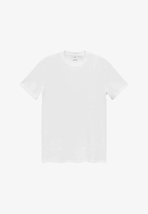 Majica s kratkimi rokavi in okroglim izrezom, bela, izdelana iz mehke bombažnega materiala. Ima ravno spodnje robove in minimalističen dizajn brez vzorcev ali okrasnih elementov.