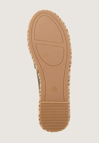 Rubber footwear sole, featuring a textured brown surface with a patterned edge. Size 40 indicated on the sole.