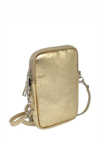 Sac bandoulière métallisé doré avec fermeture éclair, surface texturée et bandoulière réglable. Comprend un petit détail en métal argenté.