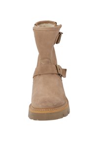 Delvis mockalankstövel i ljusbrun med två justerbara remmar och en texturerad gummisula, med en mjuk inre foder.