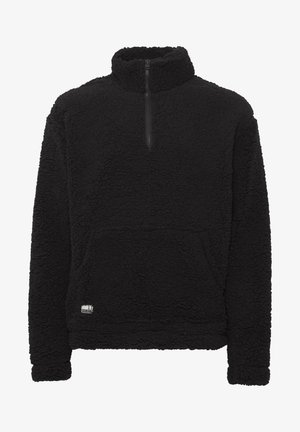 Black fleece pullover with a quarter-zip collar, textured surface, front pocket, and a small logo tag at the hem.