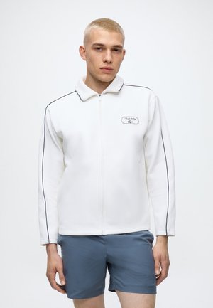 Lacoste Sport, Тренировъчно яке - flour/navy blue