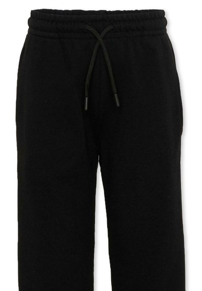 Pantalon de survêtement en polaire noir avec taille élastique et cordon de serrage, vu de face sur fond blanc.