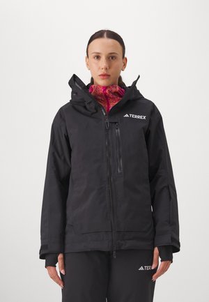Schwarze wasserdichte Jacke mit Reißverschluss, verstellbarer Kapuze und Logo auf der Brust. Verfügt über einen inneren Kragen und elastische Bündchen für Wärme.