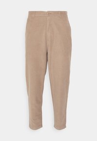 Beiga bomullsbyxor med rak passform, med knappstängning, sidofickor och smala avsmalnande ben. Slät textur utan synliga mönster.