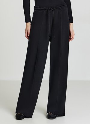 Calliope GINNICI PALAZZO - Tracksuit bottoms - ultrablack