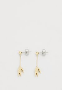 Gold-tone dangle earrings featuring a tooth-shaped charm, connected by a fine chain, with a silver-tone stud backing.