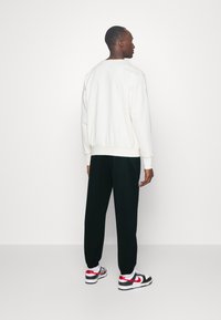 Nike Performance BKN MNK DF SPTLIGHT PNT - Klubruházat - black/white
