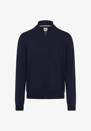 Veste zippée bleu marine avec col montant, poches latérales et poignets côtelés. Tissu lisse avec un design minimaliste.