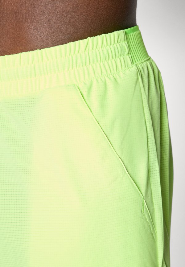 TENNIS ERGO - Sports shorts - lucid lemon3