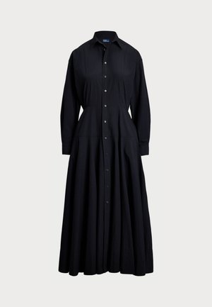 Black button-up dress made of lightweight fabric. Features a collared neck, long sleeves, full skirt, and a button-down front design.
