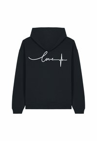 Čierna mikina s kapucňou s veľkým bielym nápisom "love" a dizajnom srdcovej línie na chrbte. Vyrobená z mäkkej zmesi bavlny, obsahuje kapucňu.