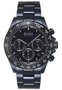 Zwarte roestvrijstalen chronograafhorloge met drie sub-dials, lichtgevende wijzers en een gestructureerde bezel. Verstelbaar schakelarmband ontwerp.