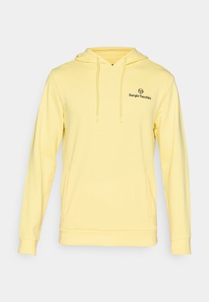 Yellow hooded sweatshirt made of soft fabric, featuring a kangaroo pocket, ribbed cuffs, and a small black logo on the chest.