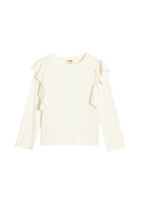 Pitkähihainen ribbikuvioitu paita off-white-värissä, jossa on kerrokselliset volangikoristeet yhdellä olkapäällä. Ominaisuuksiin kuuluu pyöreä pääntie ja suora helma.