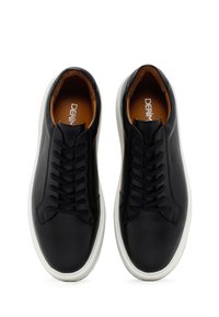 Black leather sneakers with a smooth texture, featuring a white rubber sole, round toe, and lace-up design. Interior has a brown lining.