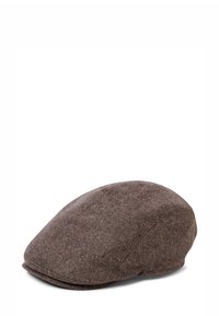 Brown tweed flat cap angled to show side and front with a short, curved brim on a white background.