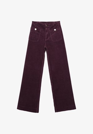 Pantaloni in velluto a coste a gamba larga di colore viola scuro, con due tasche frontali, chiusura con bottone e tessuto morbido e strutturato.