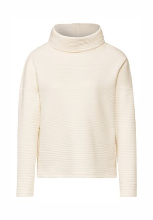 Krämsk turtlenecksweater i en ribbad textur, med en avslappnad passform och långa ärmar, tillverkad av ett mjukt, lätt material.
