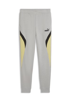 Jasnoszare spodnie dresowe Puma z elastyczną talią, czarno-żółtymi zakrzywionymi paskami po bokach oraz logo Puma na górnej części lewego uda.