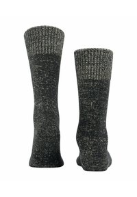 Stricksocken mit einem gerippten Schaft, aus einem strukturierten dunkelgrauen Stoff mit hellen Sprenkeln; hohe Design geeignet für Komfort und Wärme.