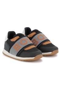 Black and gray athletic shoes with mesh upper, padded collar, brown accents, and adjustable strap featuring the text "BOS." Rubber sole.