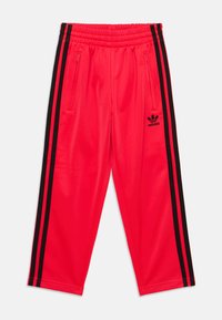 adidas Originals FIREBIRD UNISEX  - Tepláky - lucid red