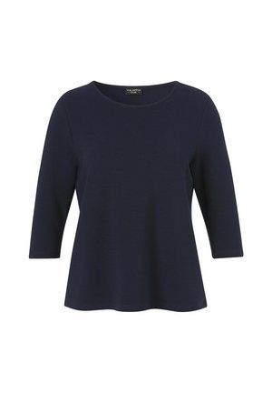 Navyblaues Damenoberteil mit dreiviertel Ärmeln und rundem Ausschnitt, hergestellt aus einem weichen, glatten Stoff.