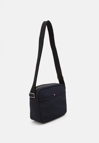 Tommy Hilfiger FUNC MINI MESSENGER UNISEX - Skuldertasker - space blue
