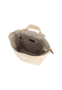 Borsa a tracolla beige con superficie texturizzata, dotata di chiusura con zip, manici doppi e un ampio interno con tasca.