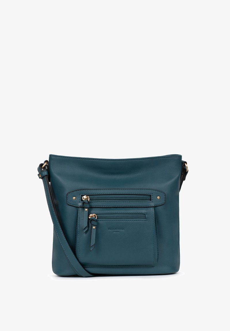 Borsa a tracolla in pelle color teal con tasca con zip, hardware tono oro e tracolla regolabile. Texture liscia con design minimalista.