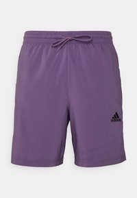 Fialové sportovní šortky s elastickým pasem a stahovací šňůrkou. Na spodní levé straně se nachází černé logo Adidas. Hladký povrch.