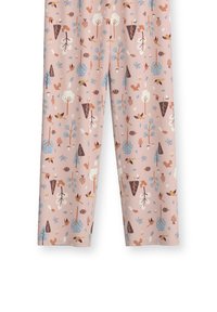Lichtroze legging met een speelse print van bomen, bloemen, dieren en geometrische vormen in blauwe, bruine en witte tinten.