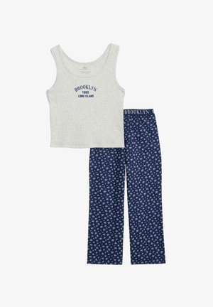 Grijze tanktop met de opdruk "BROOKLYN 1993 LONG ISLAND" en marineblauwe broek met een witte bloemenpatroon. Zacht katoen materiaal, relaxed fit.