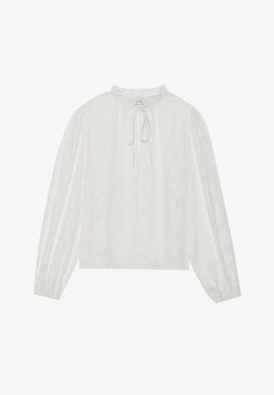 White long-sleeve blouse with a textured floral pattern, gathered neckline, and ties. Straight cut with slightly puffed sleeves.